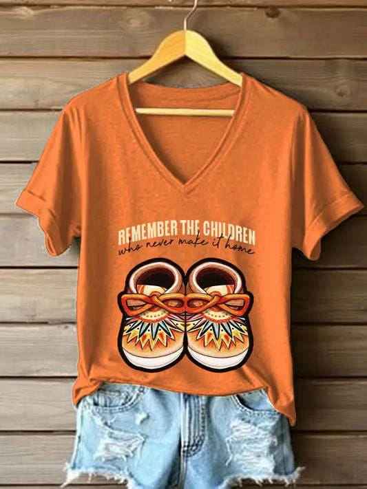 Women’s remember the children who never make it home V-neck T-shirts Orange / S
