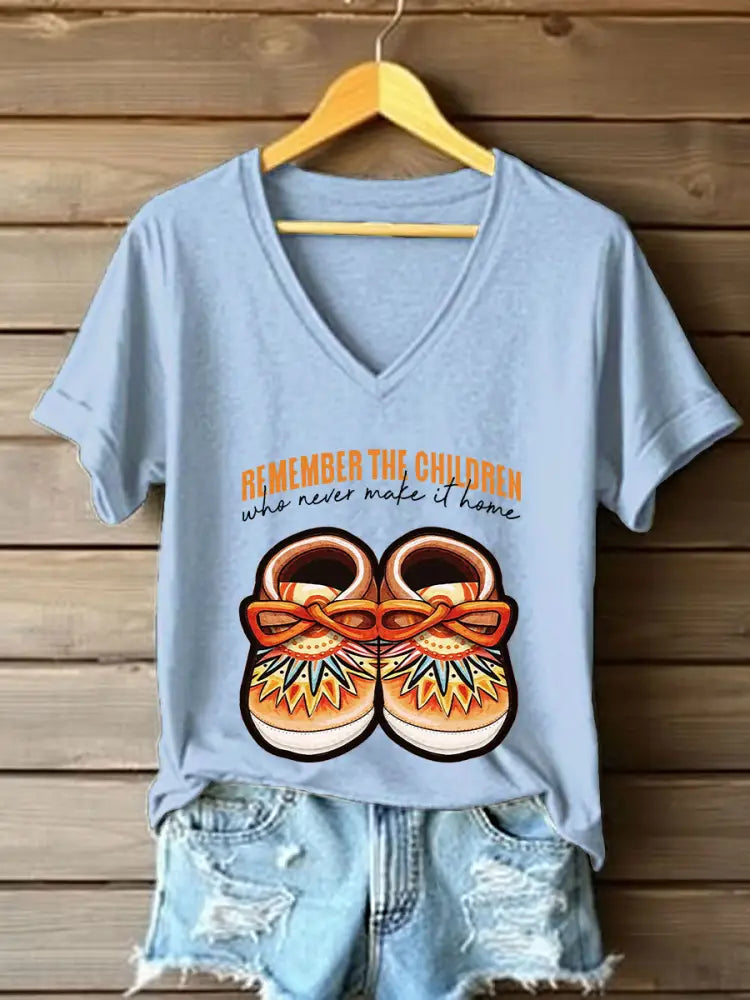 Women’s remember the children who never make it home V-neck T-shirts Sky Blue / S